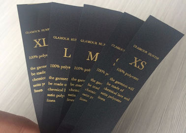 Китай Ярлыки стикера черноты бренда яркого блеска изготовленные на заказ с горячим штемпелюя печатанием логотипа выбивая завод
