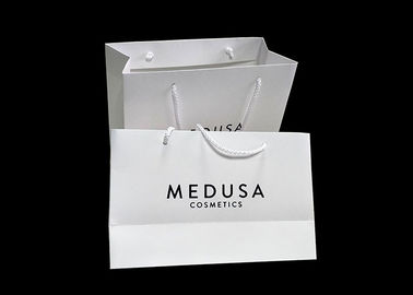 Напечатанное белой бумагой слоение причудливого изготовленного на заказ логотипа бумажных мешков лоснистое